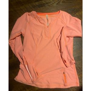 Lululemon size 12 pullover sweater with light stain.